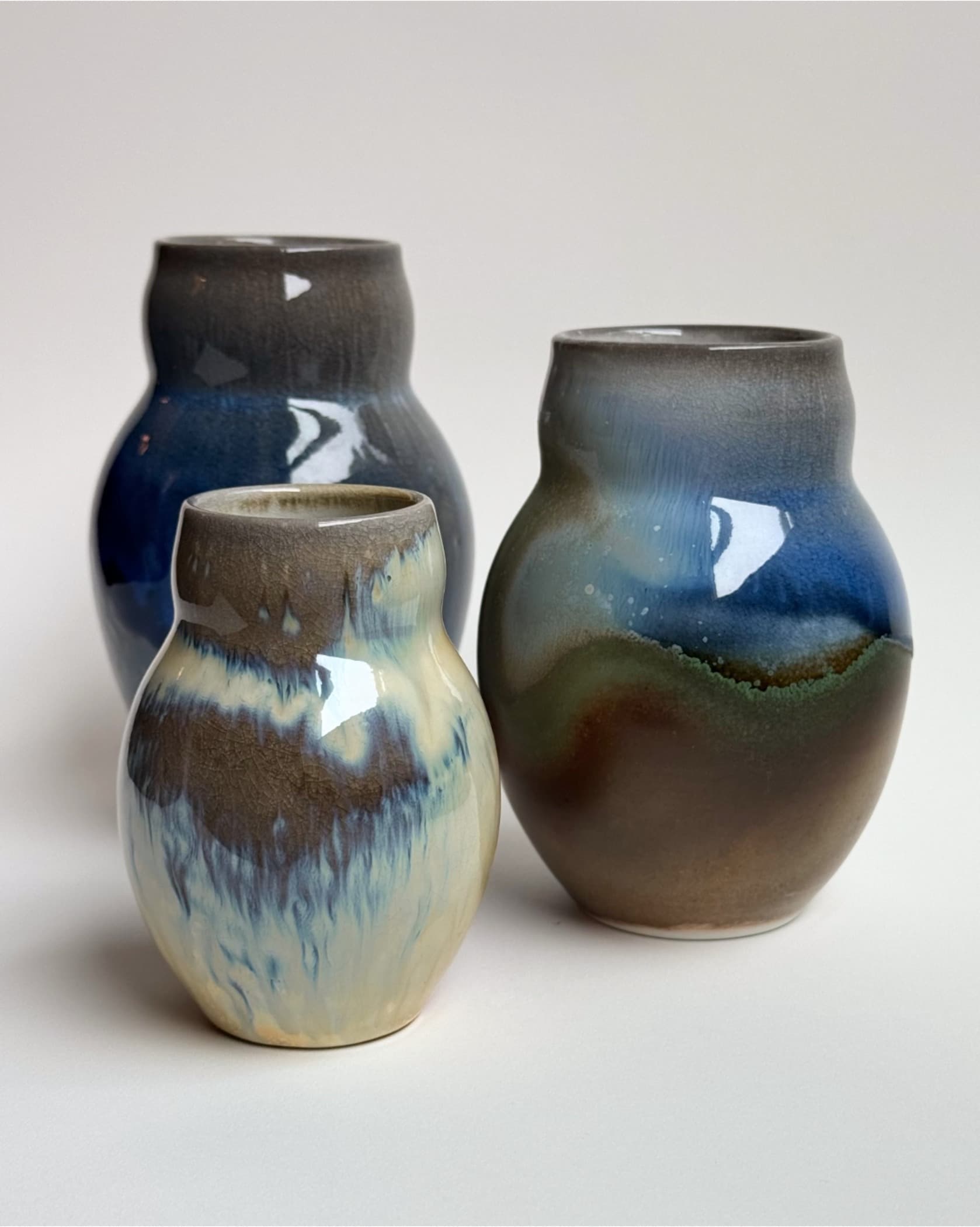 Group of small soda fired potion bottles with